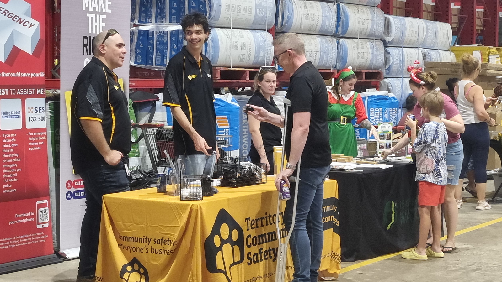 TCSCC and NHWNT staff at the Palmerston Bunnings Warehouse Christmas Night Market.