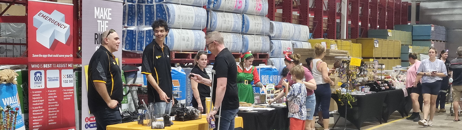 TCSCC and NHWNT staff at the Palmerston Bunnings Warehouse Christmas Night Market.